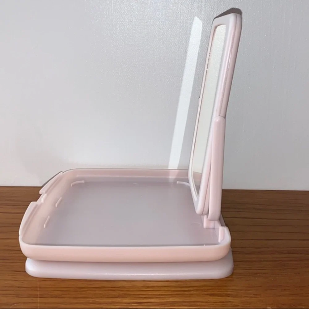 Mary Kay NWOT pink compact travel mirror. In original wrapping.